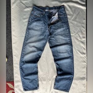 Faded Levi’s 550 jeans